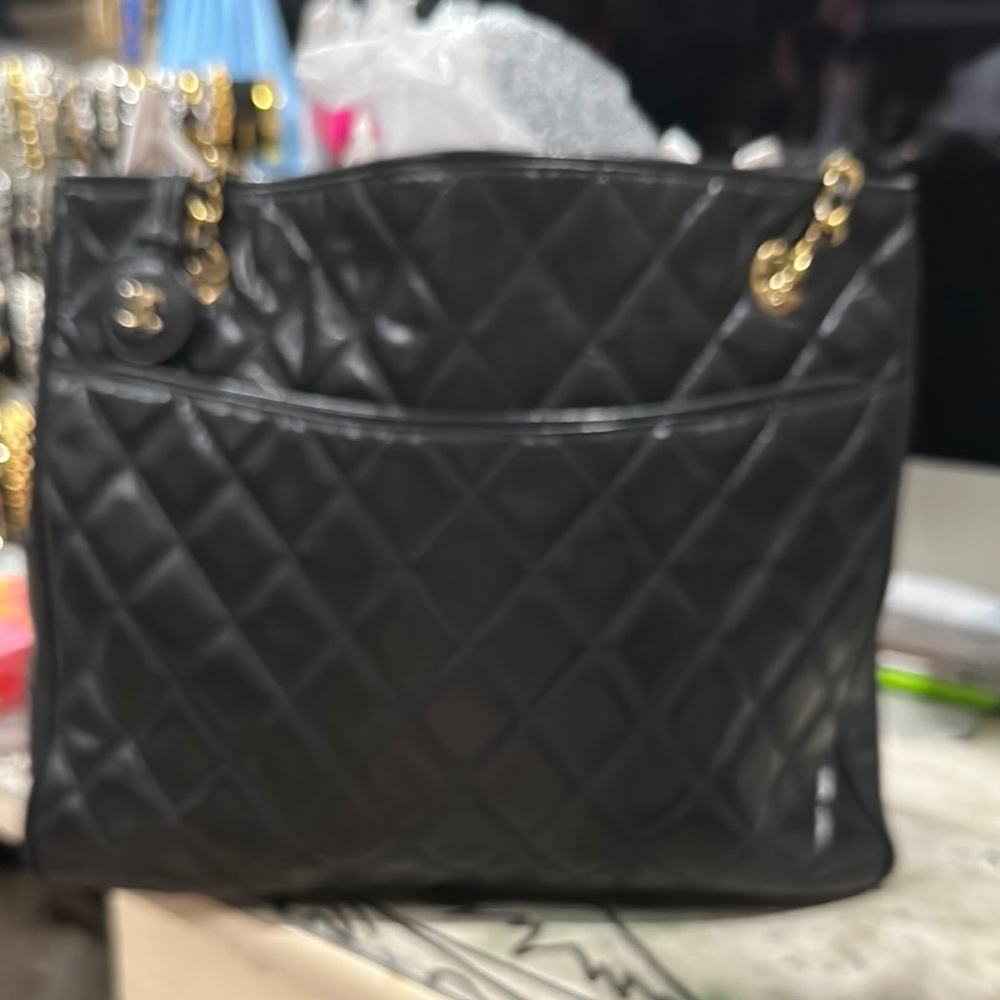 CHANEL Black and Gold Quilted Shoulder Bag